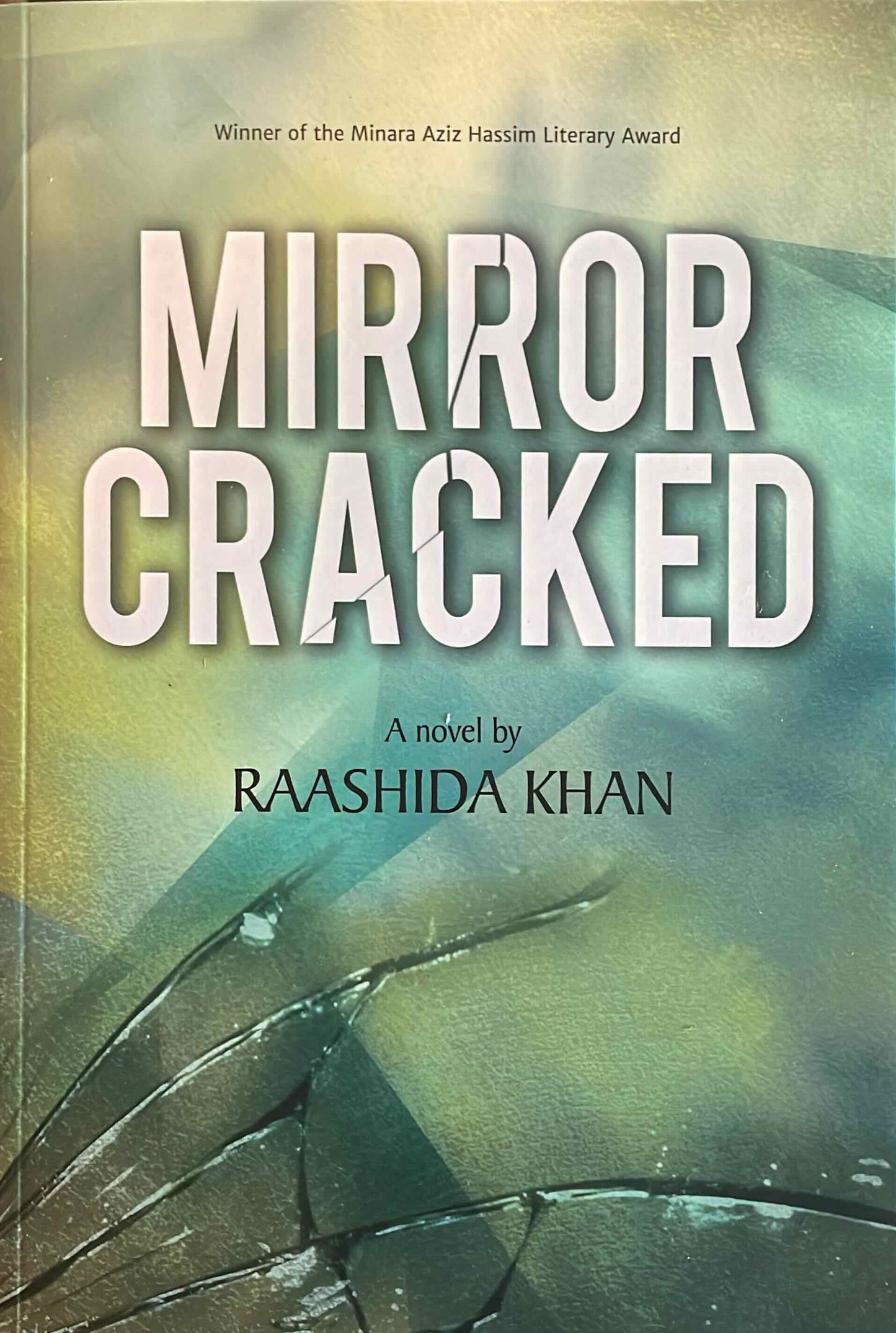 Mirror Cracked, by Raashida Khan